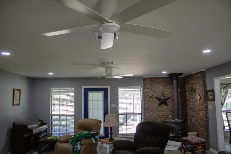 Popcorn ceiling removal — living room view